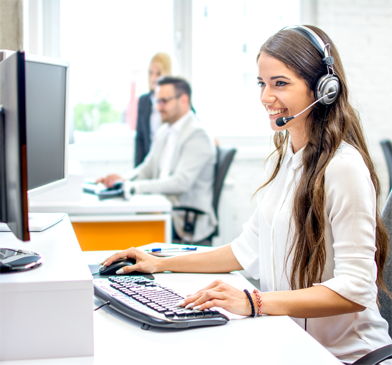 Woman agent at financial institution with other employees in background